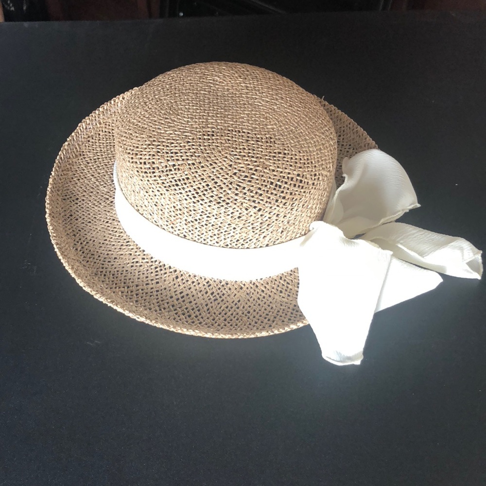 Straw hat with bow. NWOT